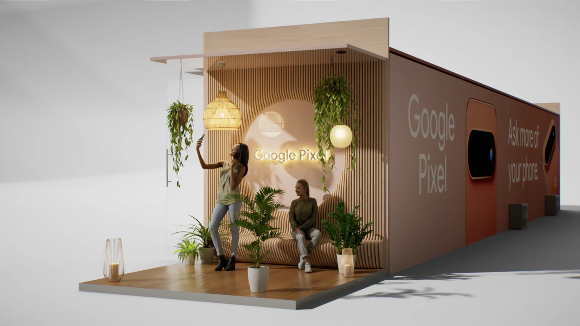 Salon extérieur en bois, suspensions et plantes, contre la façade du Pixel.