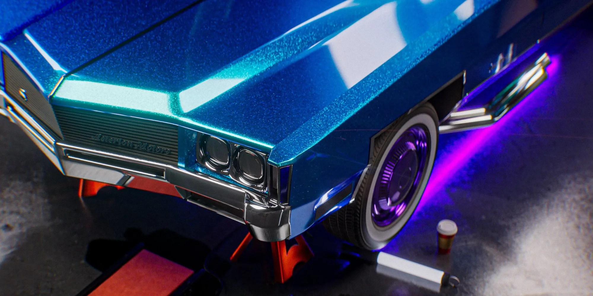 Close-up of the metallic blue coupe’s front end, its red jack stand and a coffee cup.