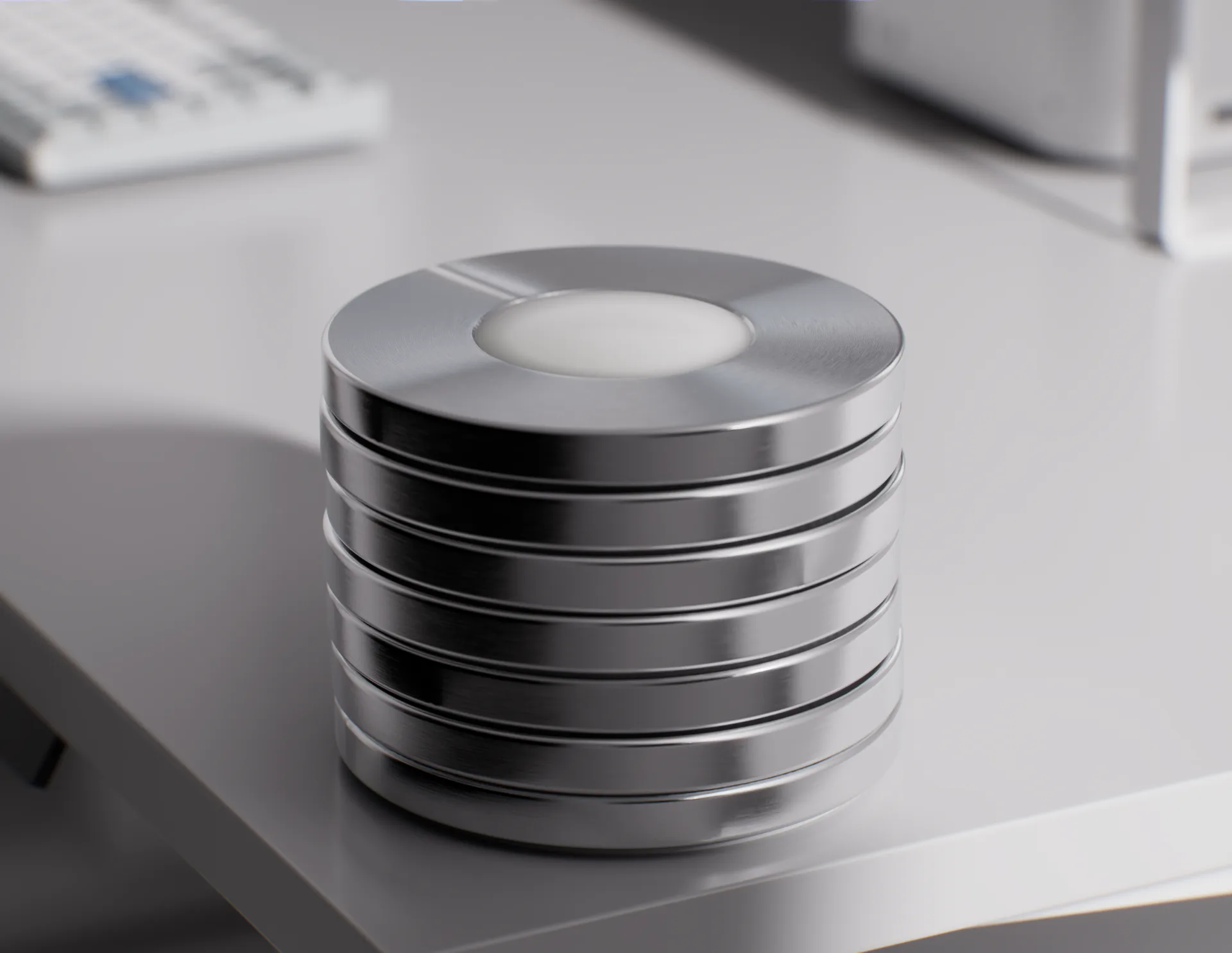 A stack of Norma discs on a desk.