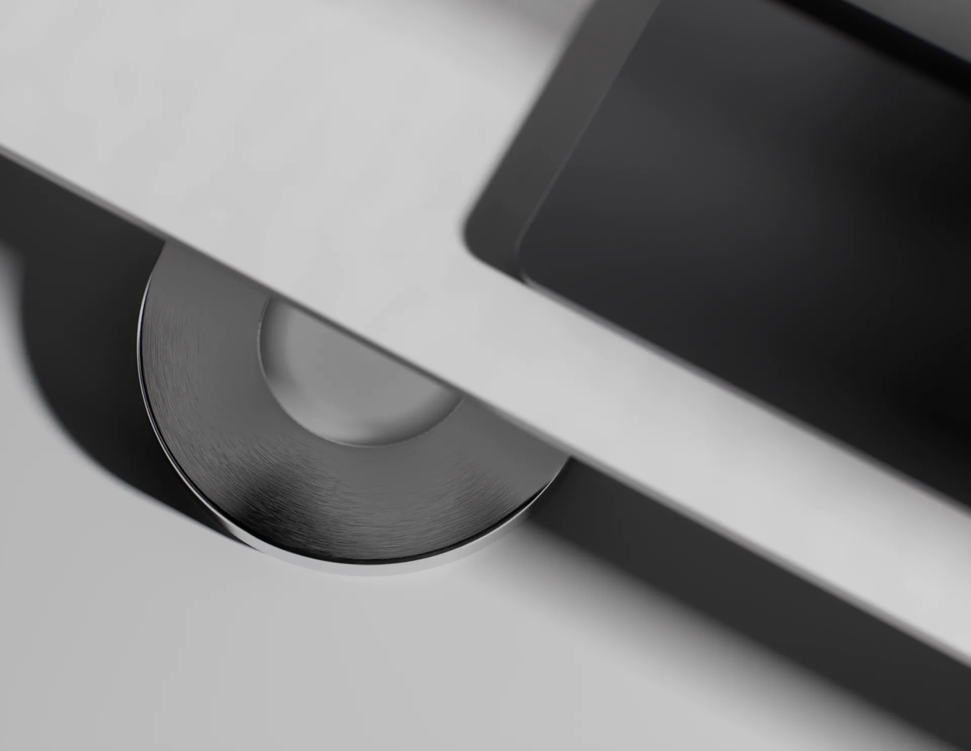 Close-up of the Norma disc’s edge at the side of a desk.