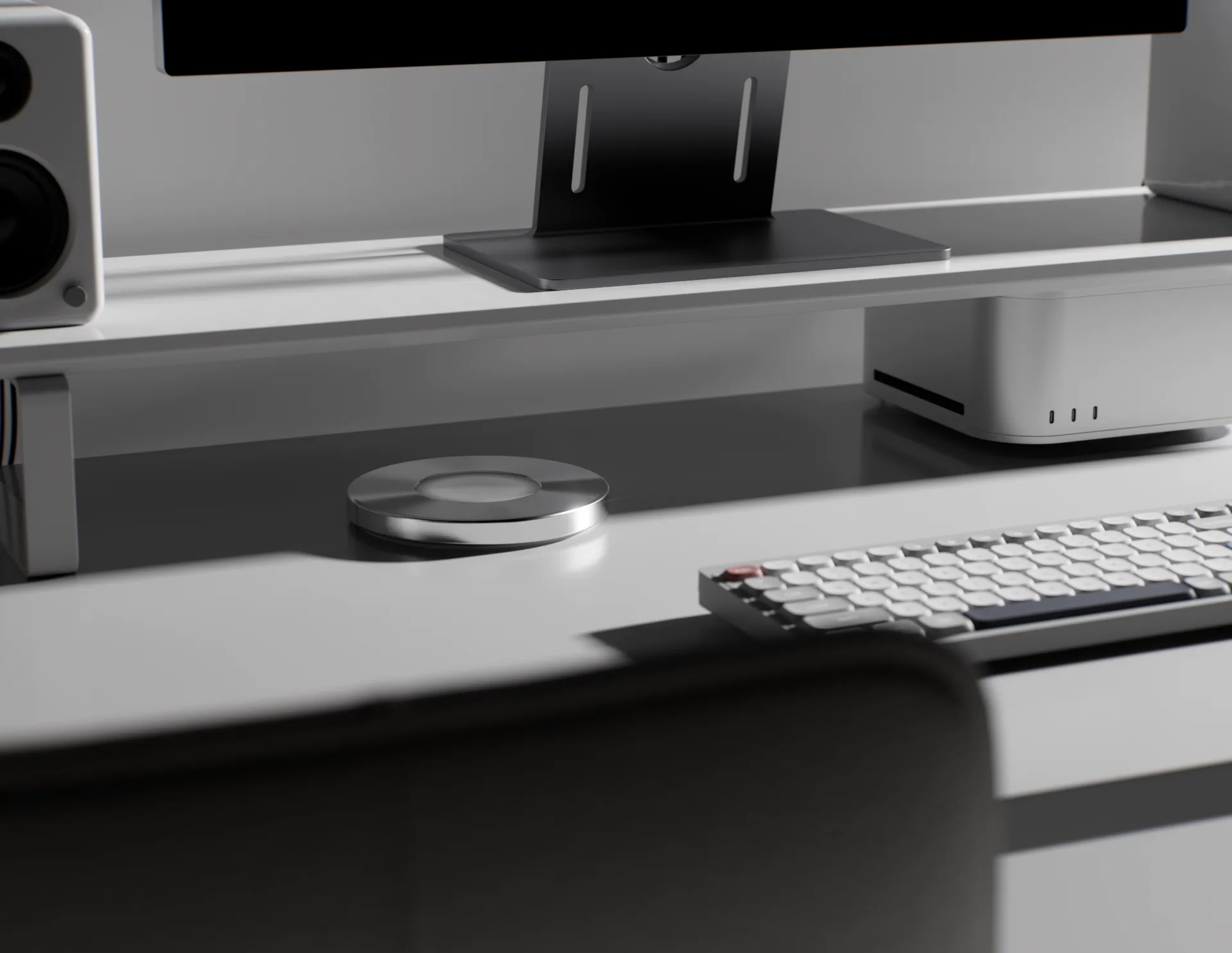 The Norma disc in front of a keyboard and a screen.