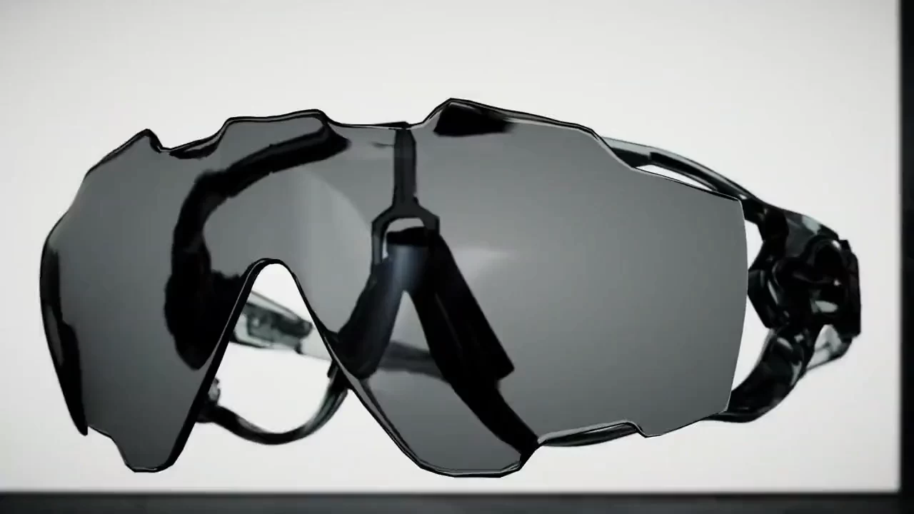 Helion++ sports glasses with dark lenses on a white background